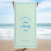 Serviette personnalisée avec fond coloré et texte